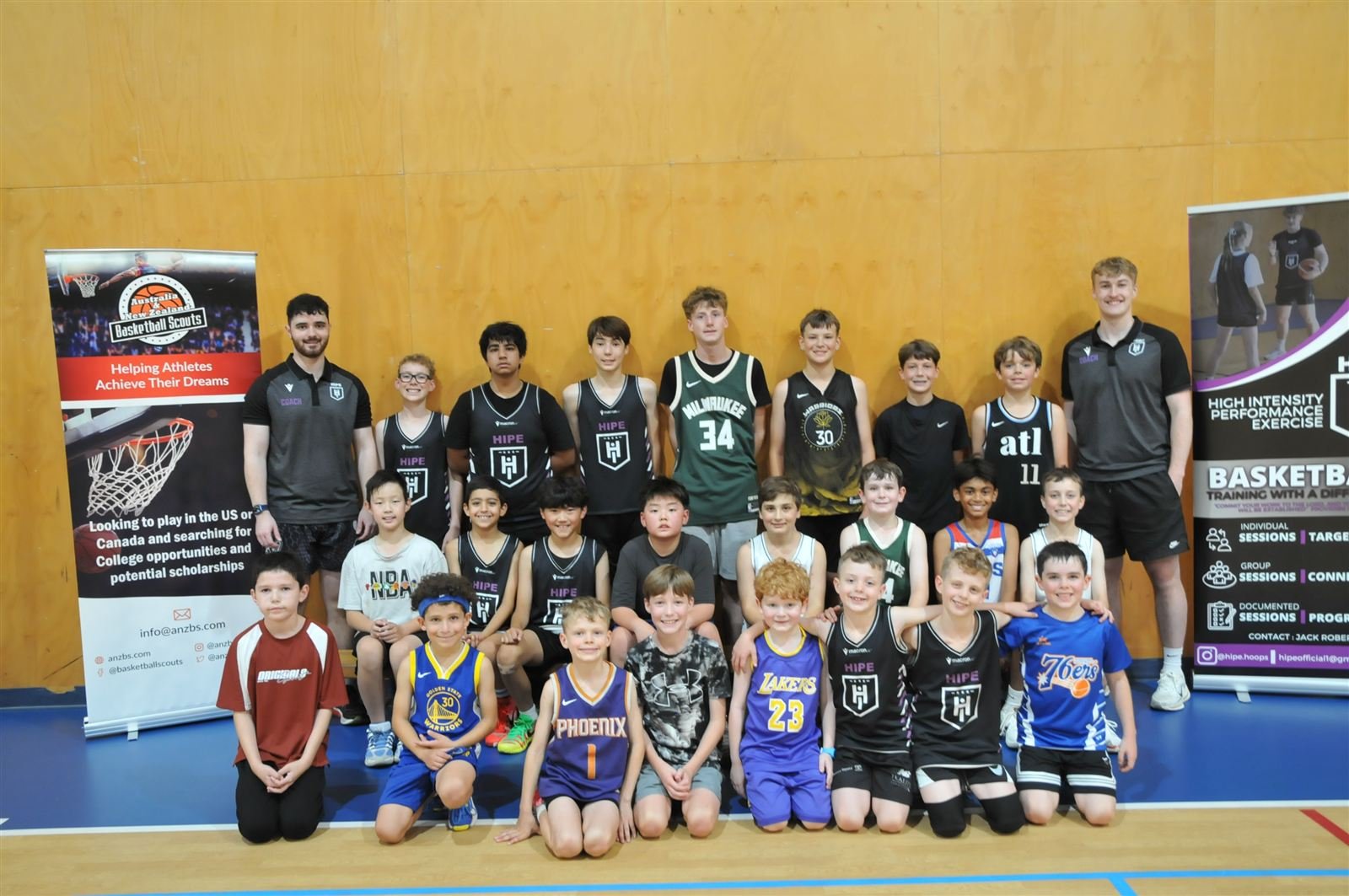 HIPE junior players and coaches together on court